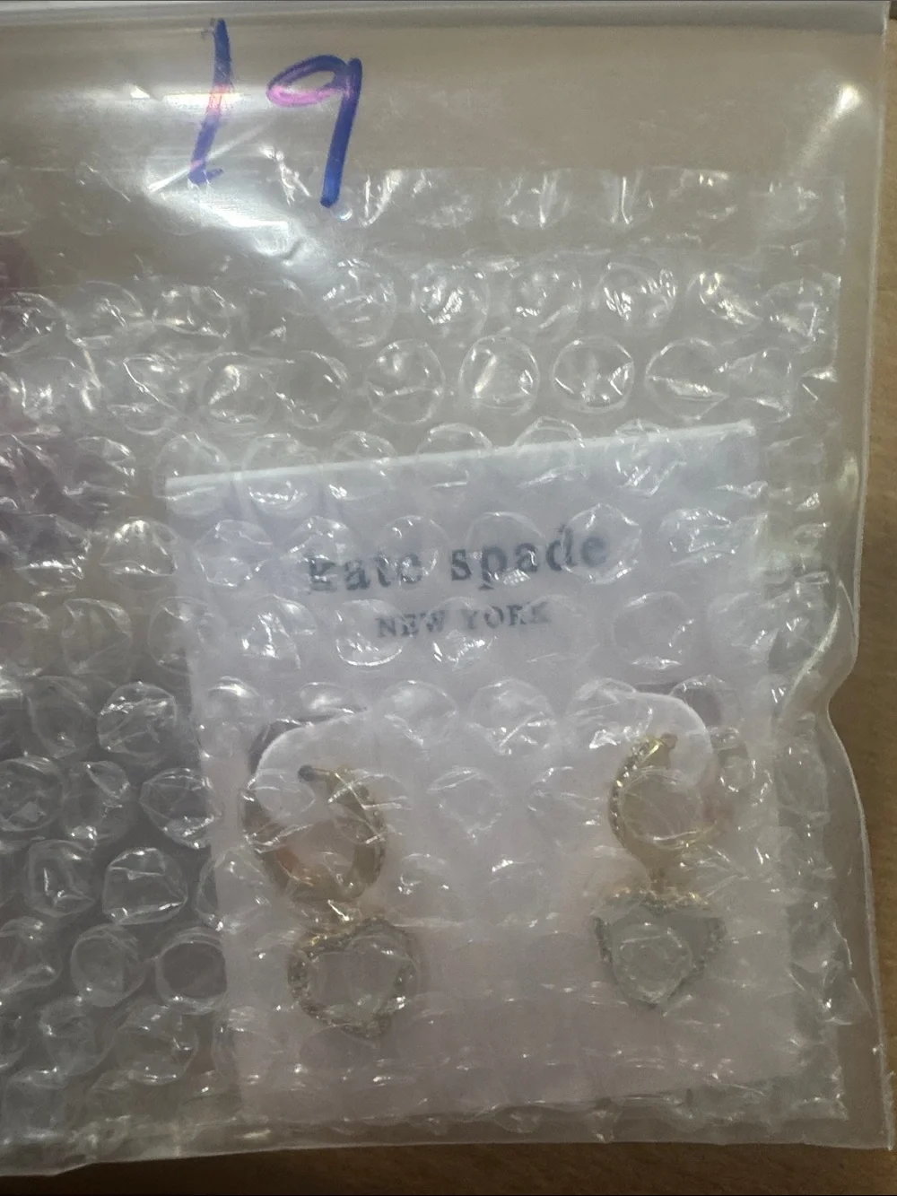 Kate Spade Mother of Pearl Gold Heart Huggies earrings